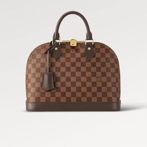 Brand new never worn excellent condition Vuitton Alma PM
